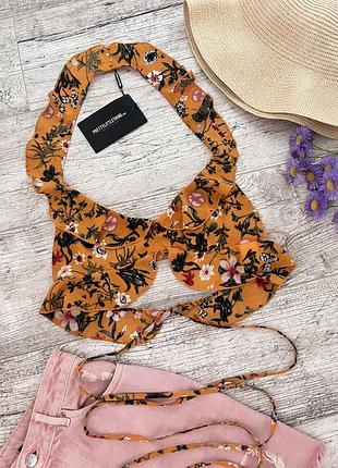 Літній короткий топ на зав’язках з воланами та відкритою спиною квітковий принт