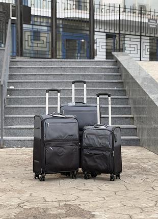 Большой чемодан дорожный тканевый нейлон l польша на колесах wings с подшипником