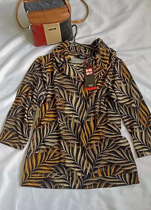 Красива кофтинка з горловиною- хомут.