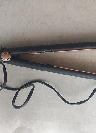 Випрамляч волосся