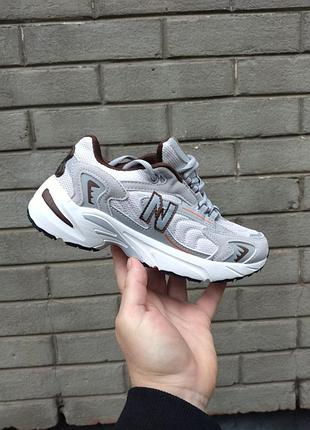Кроссівкі жіночі new balance сіро-коричньового коольору