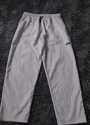 Красивые брюки жатка ткань