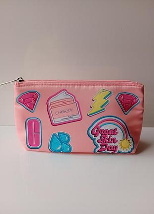 Clinique рожева косметичка.