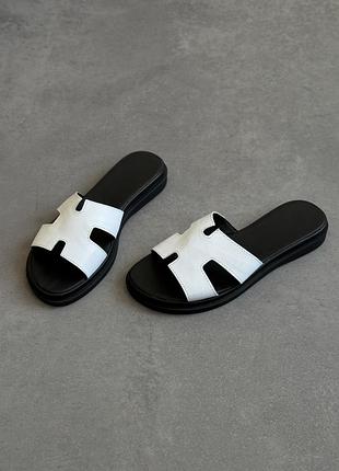 Білі жіночі шльопанці з натуральної шкіри