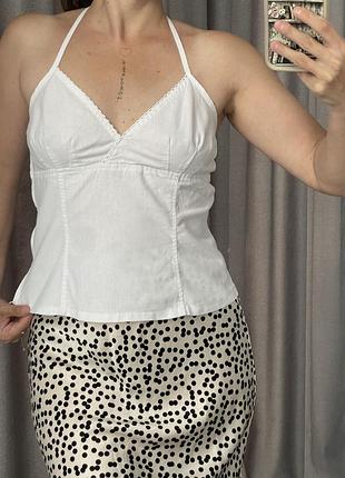 Топ з відкритою спиною і завʼязками через шию з натуральним складом