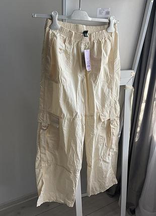 Штани карго з накладними кишенями