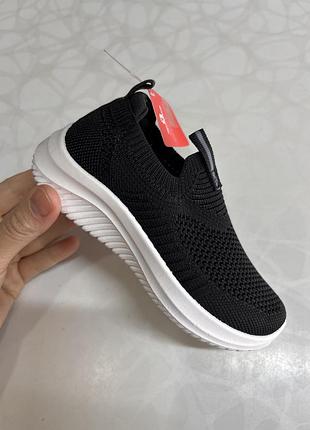 Текстильні кросівки