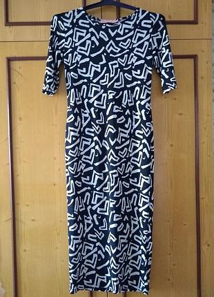 Жіноча сукня міді