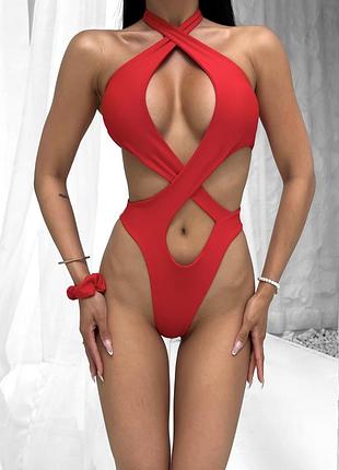 Червоний суцільний купальник з переплетами