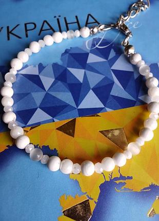БраслетNo2. с натуральными камнями. авторские украшения. белые украинские крылья.4 фото