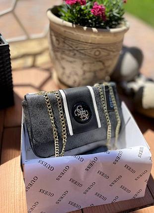 Женская сумка guess, стильная сумка guess для женщин, модная сумка guess, элегантная сумка guess, роскошная женская сумка guess