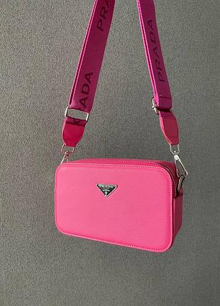 Женская розовая сумка prada, брендовая сумка prada розового цвета, элегантный аксессуар prada, модная сумка prada для женщин
