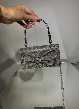 Сумка клатч жіночий вечірний з камінцями та бантом срібний с-0018