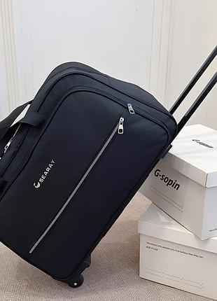 Дорожная сумка на колесах черная с телескопической ручкой 40 литров