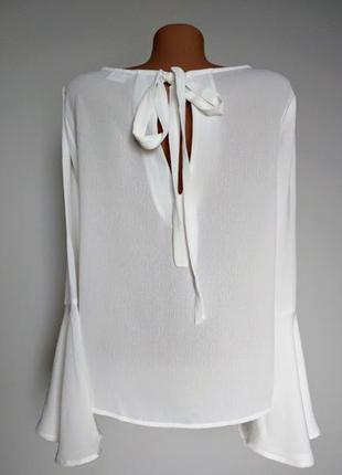 Оригинальная блуза, свободного покроя,рукав расклешенный к низу. 10(38)
