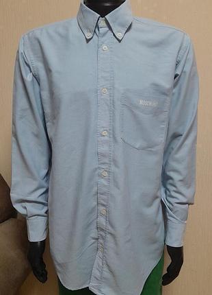 Непревзойденная хлопковая рубашка голубого цвета moschino made in italy