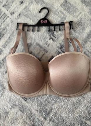 Бежевий бюст