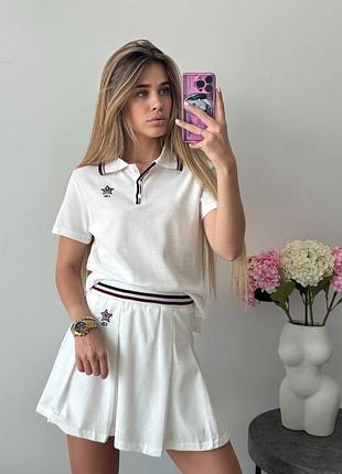 Стильний літній жіночий костюм зі спідницею брендовий