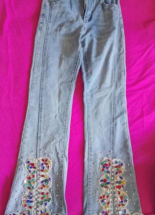 Джинсы женские