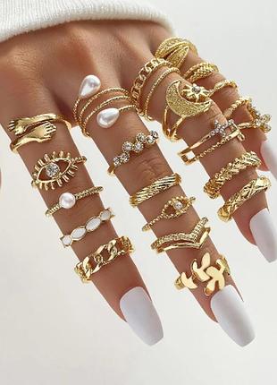 Набір кілець 22 штуки біжутерія золотого кольору