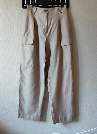 Летние брюки палаццо с карманами песочного цвета