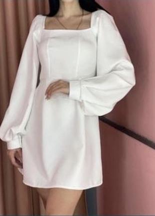 Біла сукня
