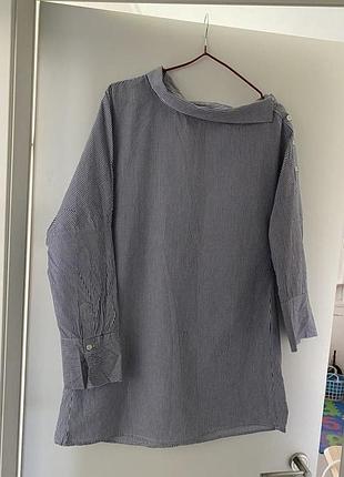 Оригінальна жіноча блуза цікавого крою в смужку