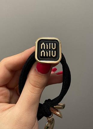 Брендова резинка для волосся