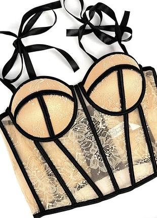 Бежевый кружевной корсет с окантовкой