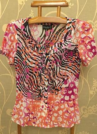 Очень красивая и стильная блузка в абстракциях.