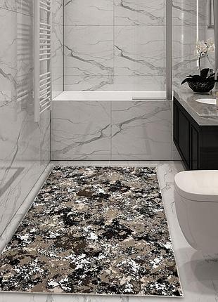 Ковер коричневый универсальный 0.6x1.1 м на резиновой основе soft brown короед 1238-3