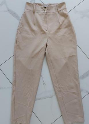 Жіночі бежеві брюки