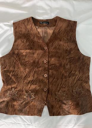 Жіноча жилетка