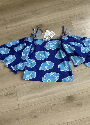 Яскрава нова блуза