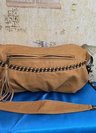 Маленька шкіряна вінтажна сумочка