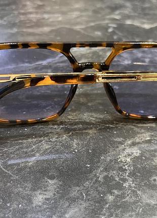 Окуляри  з блакитними лінзами