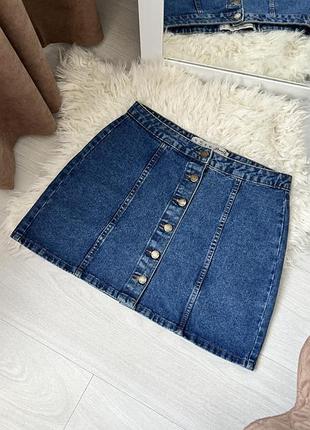 Джинсова юбка на гудзиках