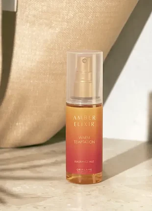 Парфюмированный спрей amber elixir warm temptation код 46805 орифлейм