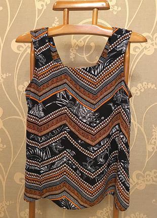 Очень красивая и стильная брендовая блузка.