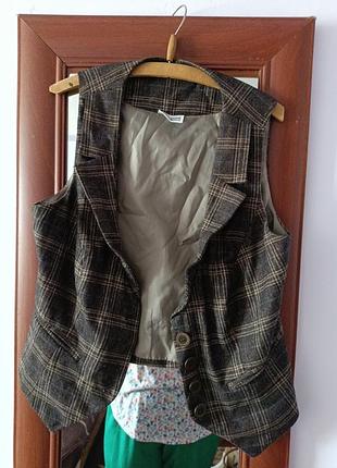 Женская жилетка