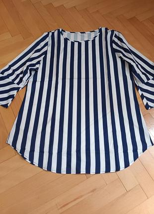 Новая женская блуза в полоску синего цвета.