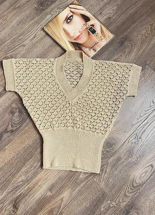 Стильна жіноча вʼязана футболка