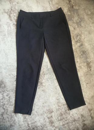 Фактурные брюки с карманами