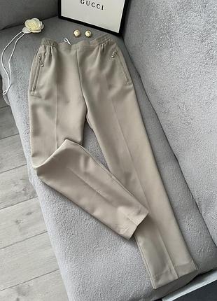 Брюки бежеві