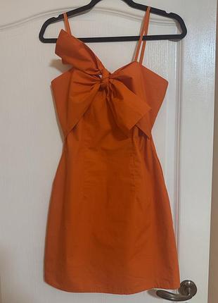 Сукня коротка з бантом на груді