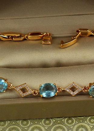 Браслет xuping jewelry лига с голубыми камнями 17 см 7 мм золотистый love-shopping