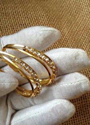 Серьги  крупные с кристаллами.