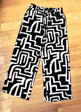 Натуральні брюки з льоном і бічними кишенями