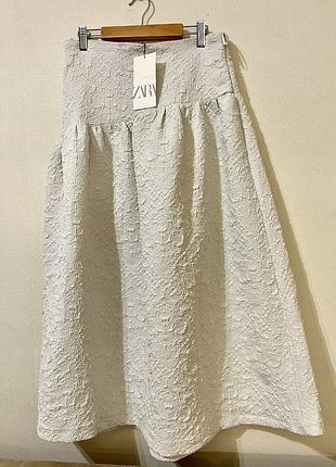 Довга біла спідниця в бохо стилі