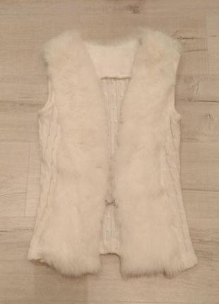 Хутряна желетка.